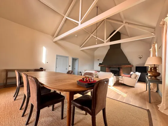 Loft conversion with exposed rafters completed by Big Sky Construction