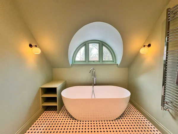 Contemporary bathroom renovation with walk-in shower, modern sanitaryware and sleek tiling by Big Sky Construction, Norfolk