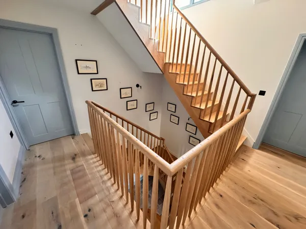First-floor landing renovation with premium flooring and quality decoration completed by Big Sky Construction, Wymondham
